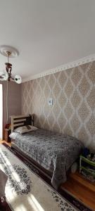 Letto o letti in una camera di Guest house with local family