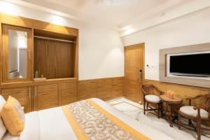 TV a/nebo společenská místnost v ubytování Hotel Aero Star By Star Group