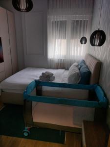 Postel nebo postele na pokoji v ubytování Stefan Lux Apartment