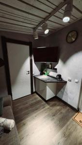 Kuchyň nebo kuchyňský kout v ubytování Add Story Guest House
