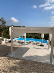 Bazén v ubytování Boutique B&B Dolce Far Niente nebo v jeho okolí