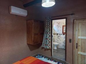 Postel nebo postele na pokoji v ubytování Riad Tamdakhte