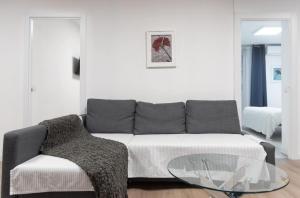 A seating area at Apartamentos Day Madrid SANTO DOMINGO Centro Gran Via Sol Malasaña