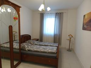 Ein Bett oder Betten in einem Zimmer der Unterkunft "FÜRSTENHAUS" EG Hofgeismar-Zentrum!