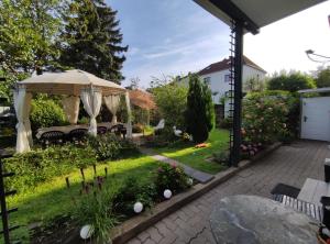 Ein Garten an der Unterkunft "FÜRSTENHAUS" EG Hofgeismar-Zentrum!