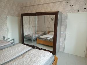 Ein Bett oder Betten in einem Zimmer der Unterkunft "FÜRSTENHAUS" EG Hofgeismar-Zentrum!