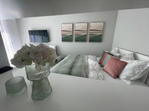 Postel nebo postele na pokoji v ubytování Eva's Appartement