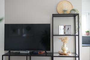 TV a/nebo společenská místnost v ubytování Ferienwohnung Martinsesch