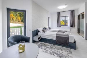 Postel nebo postele na pokoji v ubytování Vila Szabó