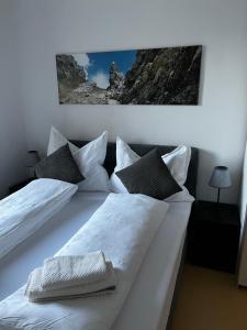 Ένα ή περισσότερα κρεβάτια σε δωμάτιο στο Apartment ANTON Innsbruck