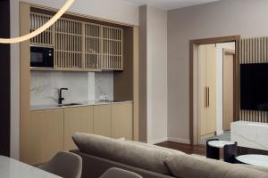TV a/nebo společenská místnost v ubytování Courtyard by Marriott Yerevan + 37 fotografií