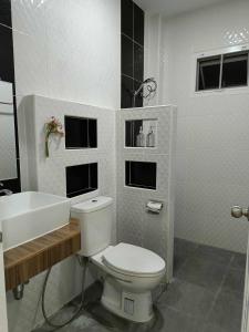 Ένα μπάνιο στο Zuala house Mini home & hostel