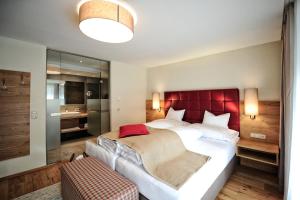 Postelja oz. postelje v sobi nastanitve Hotel Dorfstadl