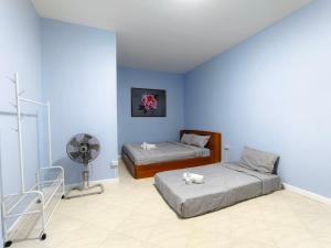 Postel nebo postele na pokoji v ubytování Inspire 888 Poolvilla & Resort + 49 fotografií