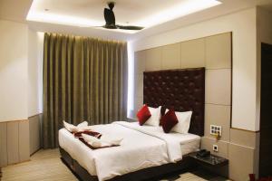 Voodi või voodid majutusasutuse Hotel k11 toas