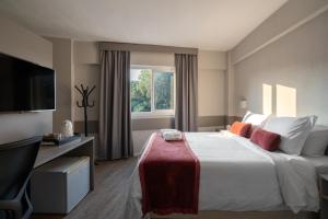Postel nebo postele na pokoji v ubytování Work Hotel Design