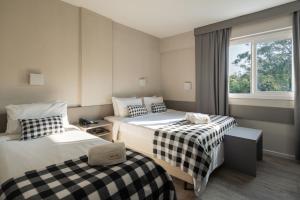 Postel nebo postele na pokoji v ubytování Work Hotel Design