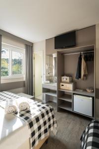 Postel nebo postele na pokoji v ubytování Work Hotel Design