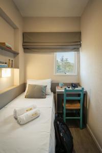Postel nebo postele na pokoji v ubytování Work Hotel Design