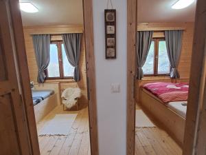 Postel nebo postele na pokoji v ubytování Ferienhaus Spitzer