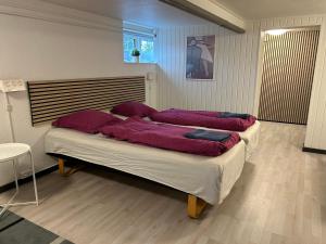 H. C. Lumbyes Vej - kælderlejlighed客房内的一张或多张床位