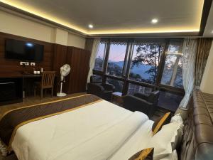 Ένα ή περισσότερα κρεβάτια σε δωμάτιο στο Hotel Lha-yul nearby MG Road Gangtok