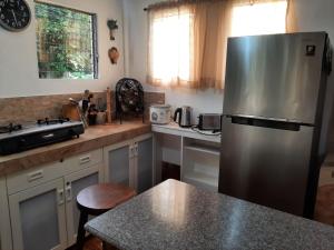 Η κουζίνα ή μικρή κουζίνα στο Private Vacation House +23 φωτογραφίες