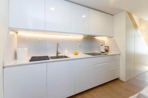 Kuchyň nebo kuchyňský kout v ubytování D&S - Antas House