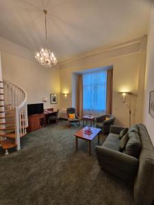 Uma área de estar em Hotel Beethoven