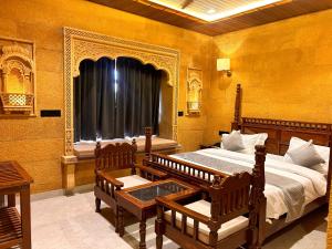 Llit o llits en una habitació de Sky Residency Jaisalmer