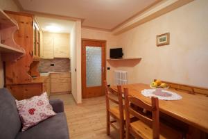 TV a/nebo společenská místnost v ubytování Appartamento Reit