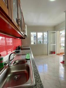 Una cocina o cocineta en Appart Hotel Rania