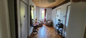 Część wypoczynkowa w obiekcie Grande maison de montagne rénovée, du charme