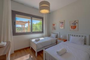 Postel nebo postele na pokoji v ubytování Charming 2-Lvl 3BR Lagoon Home in Shedwan El Gouna, Pool Access + 37 fotografií
