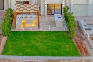 Zahrada ubytování Charming 2-Lvl 3BR Lagoon Home in Shedwan El Gouna, Pool Access