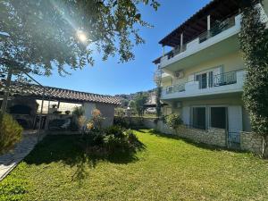 a view of the yard of a house at Alkionis Garden View Apartments in Lefkada