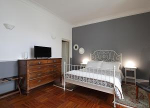 Postel nebo postele na pokoji v ubytování B&B Five Rooms