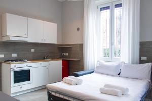 Kuchyň nebo kuchyňský kout v ubytování RRRapido Holy Suites and Rooms - Via Sardegna