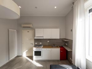 Kuchyň nebo kuchyňský kout v ubytování RRRapido Holy Suites and Rooms - Via Sardegna