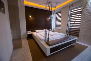 Postel nebo postele na pokoji v ubytování Element Suites