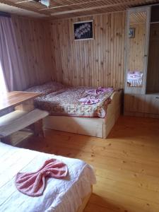 Postel nebo postele na pokoji v ubytování микуличин на долоні