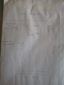 a sheet of paper with a diagram of a dress at Small double room Bromborough Wirral in Bromborough