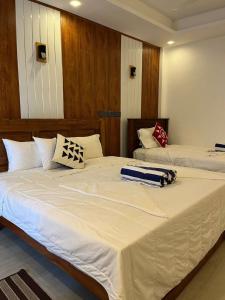 Letto o letti in una camera di NN Beach Resort Nilaveli