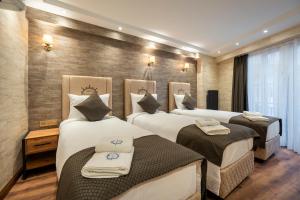 Postel nebo postele na pokoji v ubytování Old Harbour Hotel istanbul