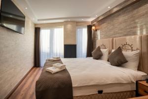 Postel nebo postele na pokoji v ubytování Old Harbour Hotel istanbul