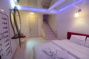 Postel nebo postele na pokoji v ubytování Element Suites