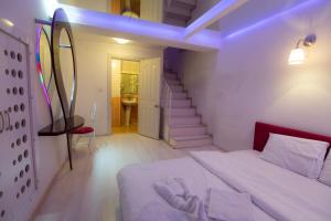 Postel nebo postele na pokoji v ubytování Element Suites