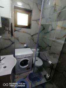 Koupelna v ubytování Vila Dajana Zminica