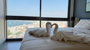 Krevet ili kreveti u jedinici u okviru objekta unixx seaview hotel
