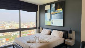 Krevet ili kreveti u jedinici u okviru objekta unixx seaview hotel